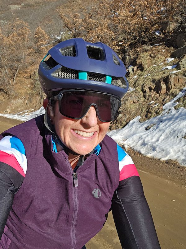 Engearment reviewer Erin Trail wearing the Pearl Izumi Expedition PRO Alpha Vest on a gravel ride